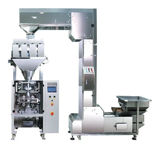 AUTOMATIC FOUR HEAD LINEAR WEIGHER WITH BAGGAR MACHINE